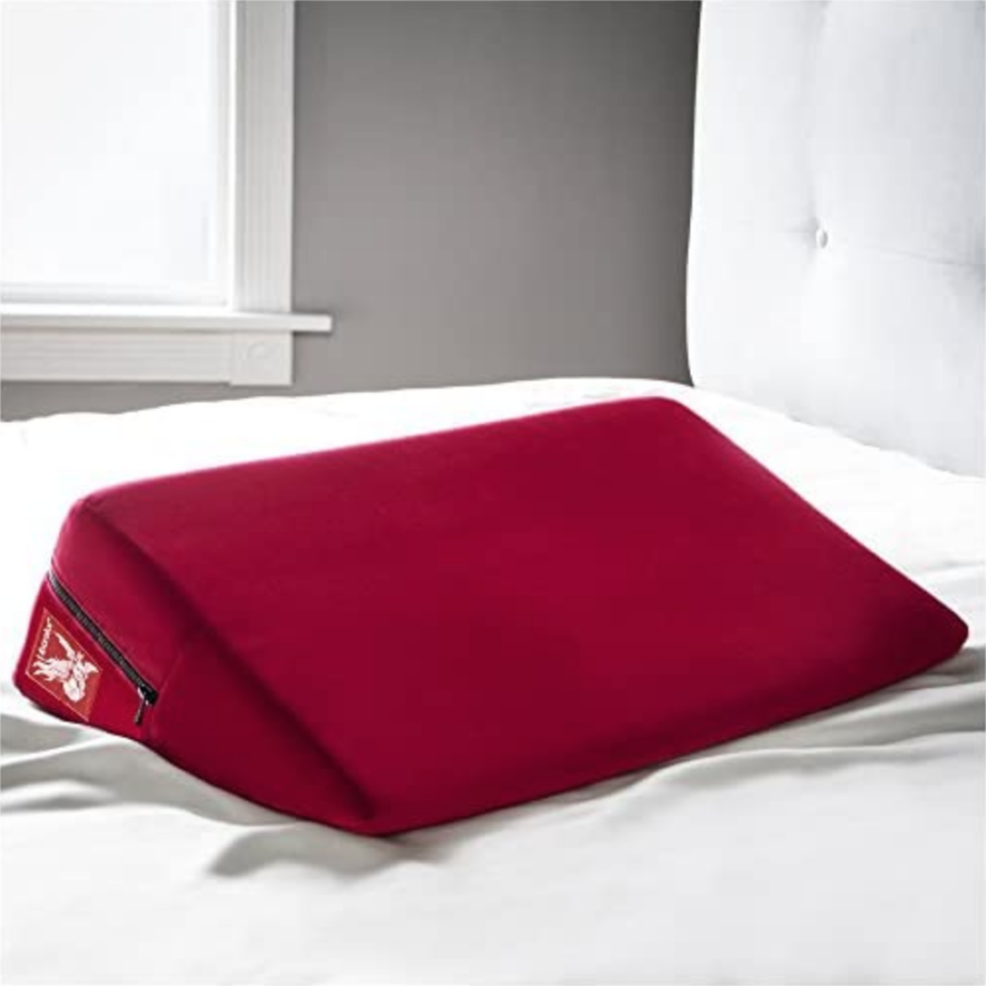 Liberator Wedge Intimate Sex Positioning Pillow in bed